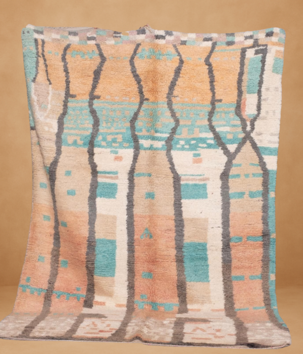 Boujad rug with a soft, earthy palette of terracotta, turquoise, beige, and charcoal grey forming vertical wavy columns and pixelated motifs. The handwoven wool texture and muted tones evoke a serene, organic aesthetic. Displayed vertically against a neutral background.