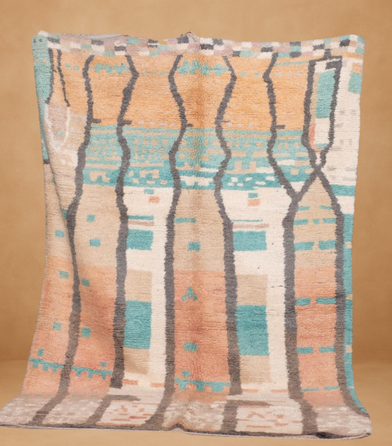 Boujad rug with a soft, earthy palette of terracotta, turquoise, beige, and charcoal grey forming vertical wavy columns and pixelated motifs. The handwoven wool texture and muted tones evoke a serene, organic aesthetic. Displayed vertically against a neutral background.