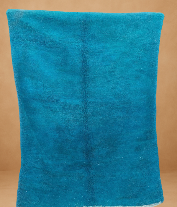 Bold Boujad rug in vibrant turquoise blue.