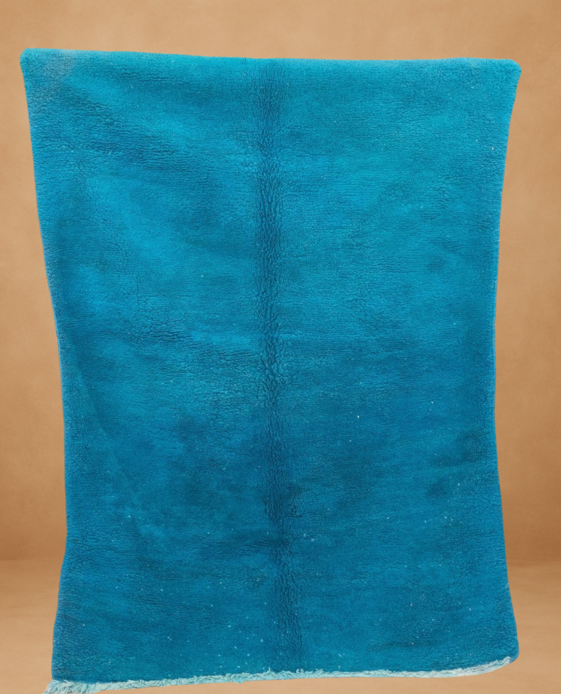 Bold Boujad rug in vibrant turquoise blue.
