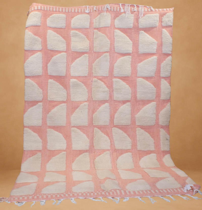 Soft Beni Werin rug in blush pink and cream, featuring a modern geometric pattern.